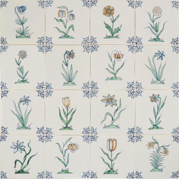 Hand-painted Delft tiles with flowers in polychrome decorated with ox-head corner motif