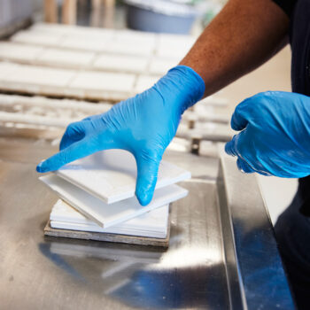 Tiles being stacked
